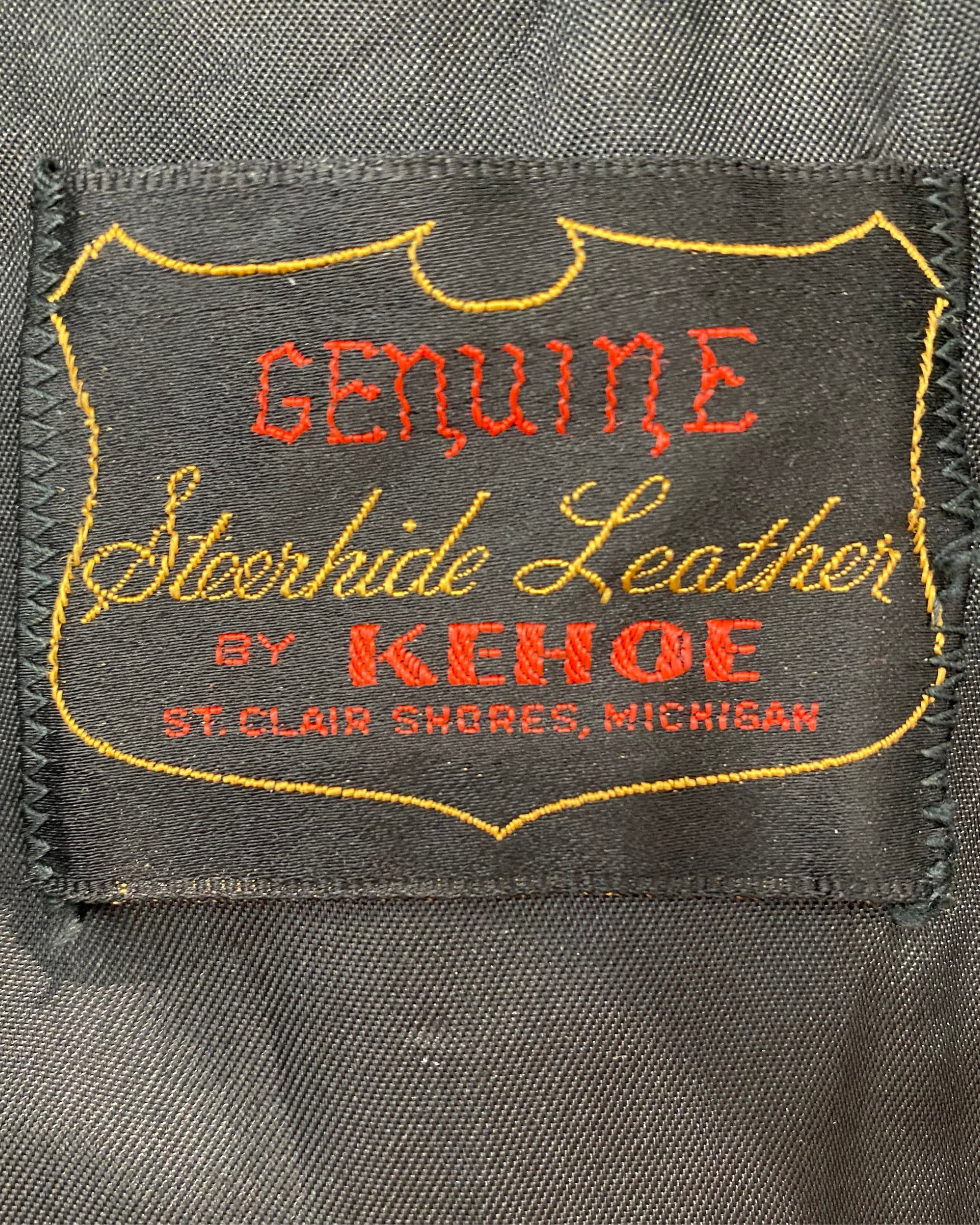 Interior label reading Genuine Steerhide Leather by Kenoe, St. Clair Shores, Michigan.