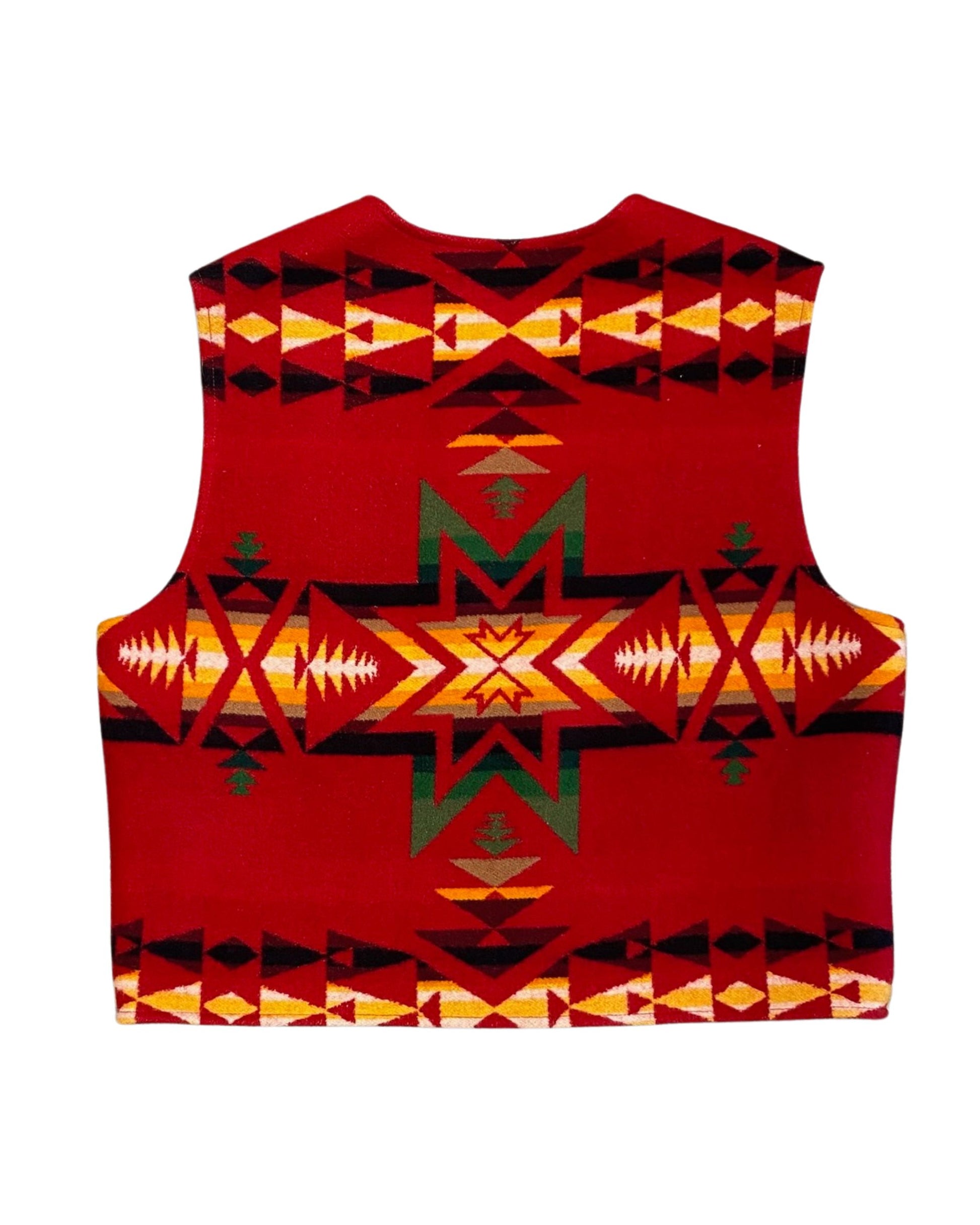 Back view of vintage Pendleton wool vest with bold red yellow black and green geometric design.
