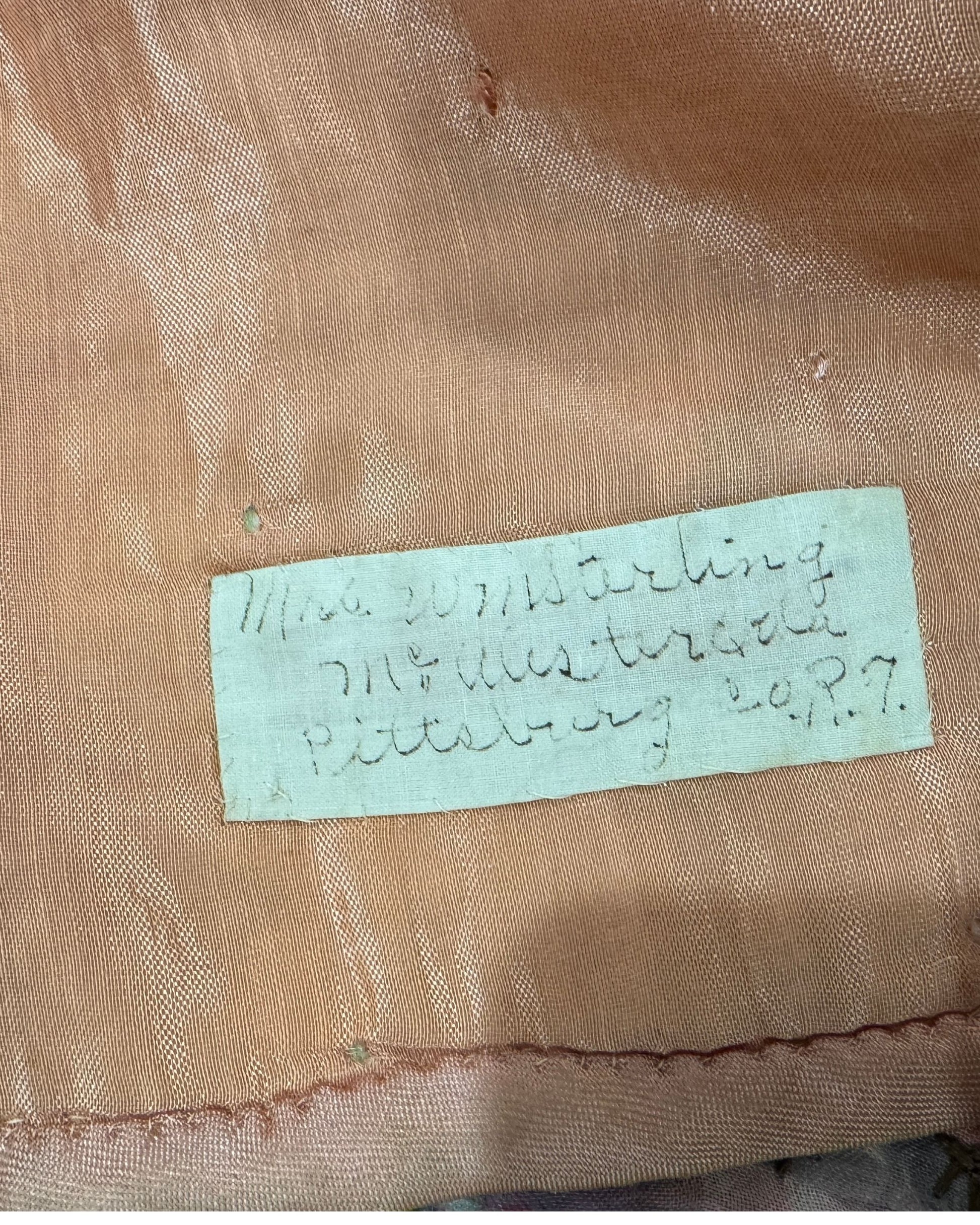 Handwritten label: “Mrs. William Sterling, Pittsburg County, OK.” on quilt reverse.