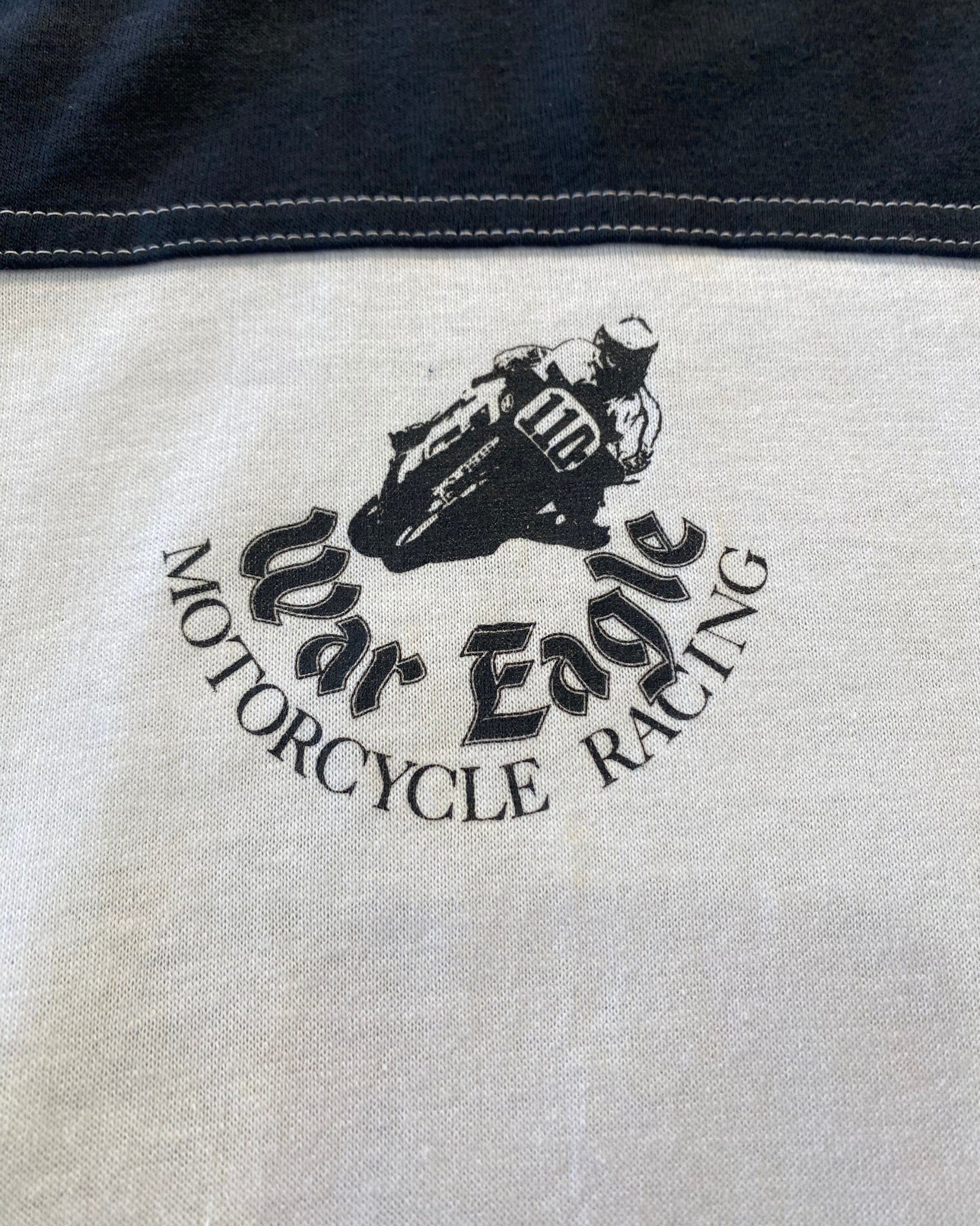 Silk Screened 'War Eagle Motorcycle Racing' logo on a fabric background
