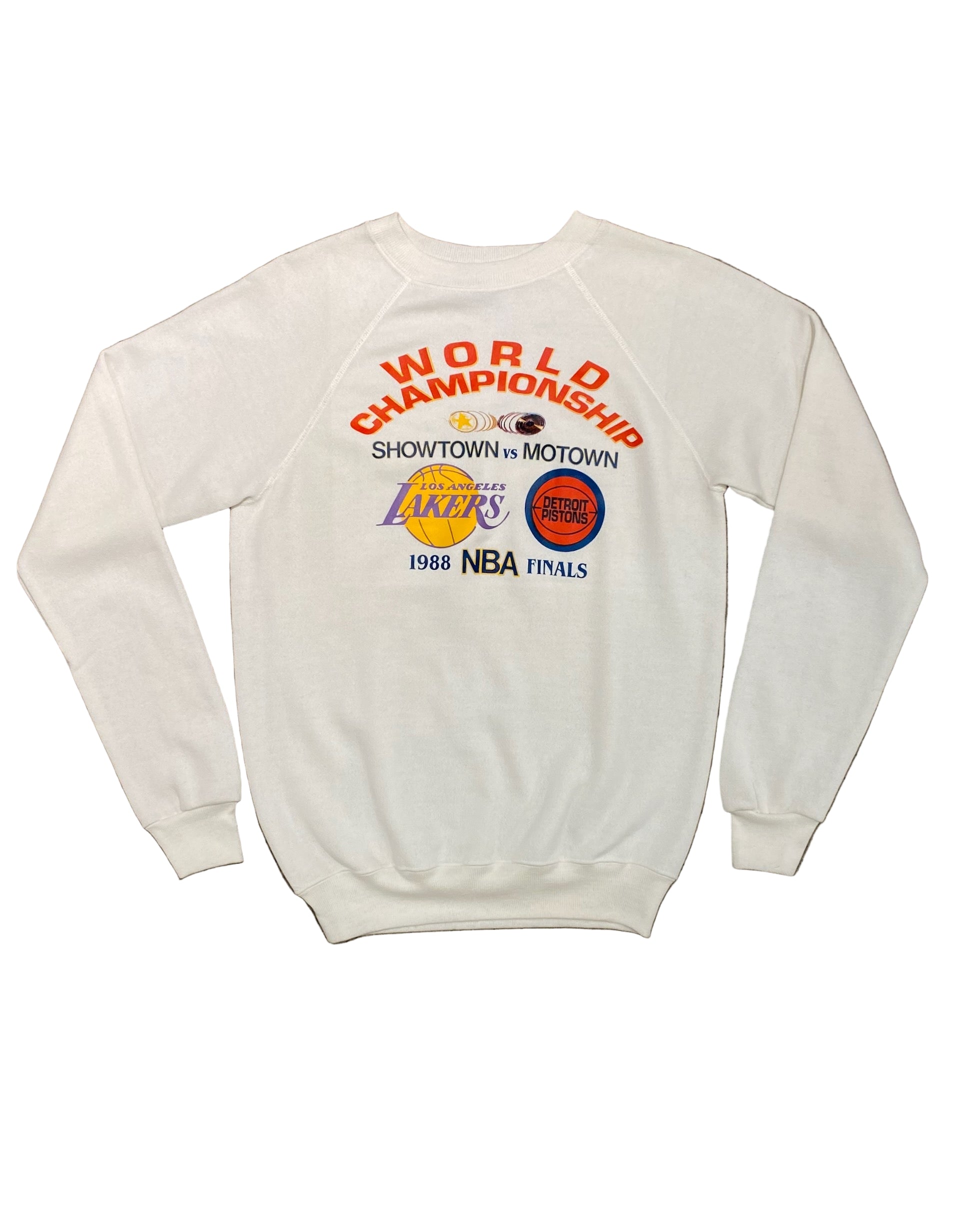Front of vintage 1988 NBA Finals sweatshirt featuring World Championship graphics with Lakers and Pistons logos.