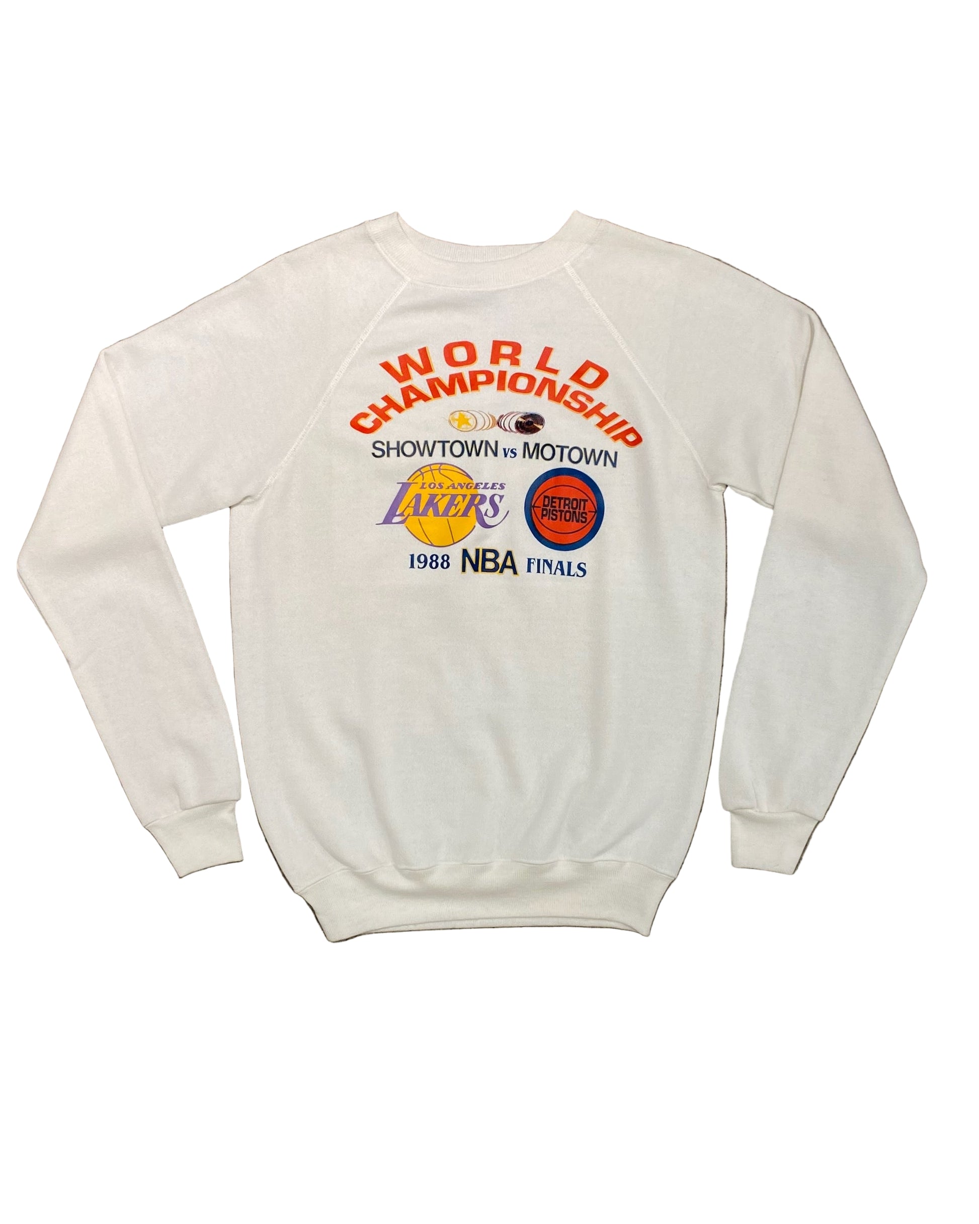 Front of vintage 1988 NBA Finals sweatshirt featuring World Championship graphics with Lakers and Pistons logos.