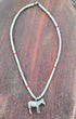 Hollow sterling silver burro pendant on vintage Southwestern bead necklace.