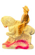 Back of vintage cowgirl on horseback, mid-century carnival figurine.

