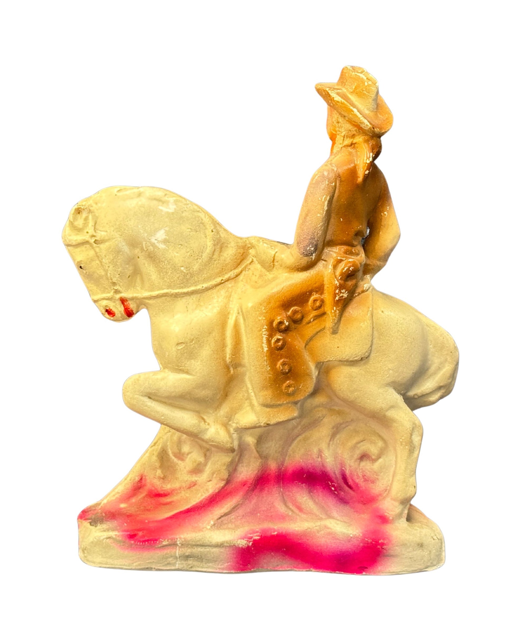 Back of vintage cowgirl on horseback, mid-century carnival figurine.

