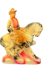 1940s chalkware cowgirl carnival prize with pink spray-painted base.