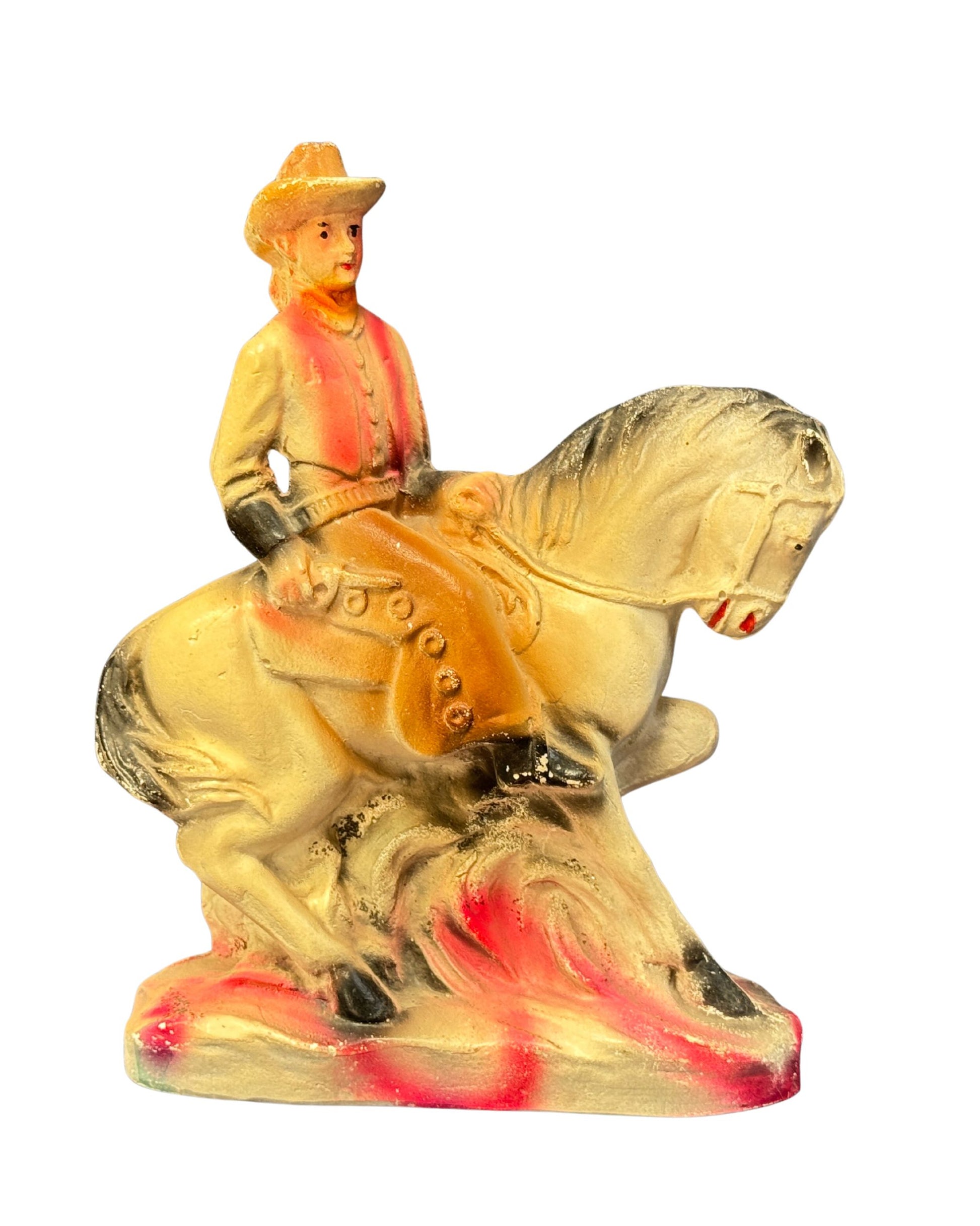 1940s chalkware cowgirl carnival prize with pink spray-painted base.