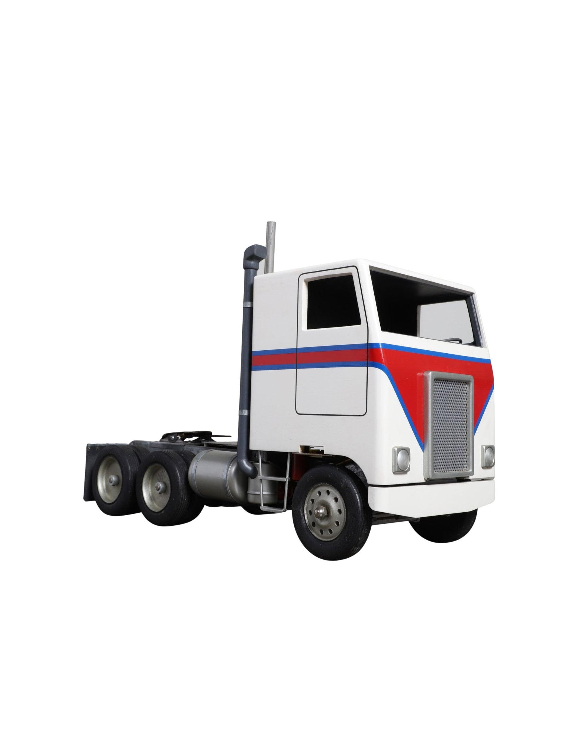 Handcrafted 1970s semi-truck model with wood body, metal parts, and rubber tires.