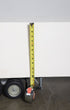 Handcrafted 1970s semi-truck model with wood body, metal parts, and rubber tires.