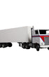 Handcrafted 1970s semi-truck model with wood body, metal parts, and rubber tires.