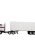 Handcrafted 1970s semi-truck model with wood body, metal parts, and rubber tires.